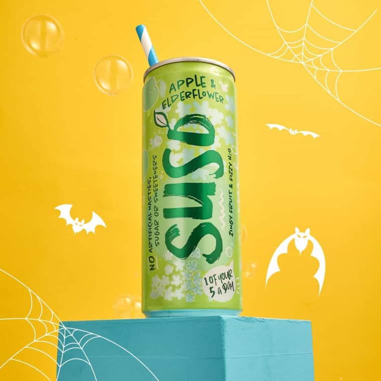 Apple & Elderflower can on yellow background with cobwebs on