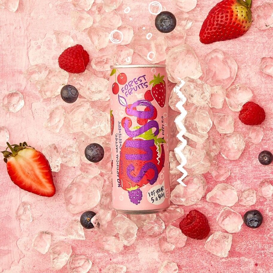 Suso Forest Fruits Can on Ice with fruit scattered around