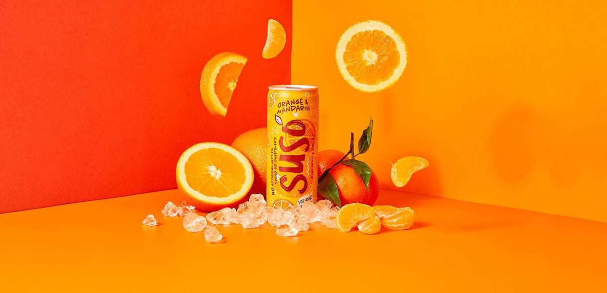Orange & Mandarin can shot with real fruit and ice